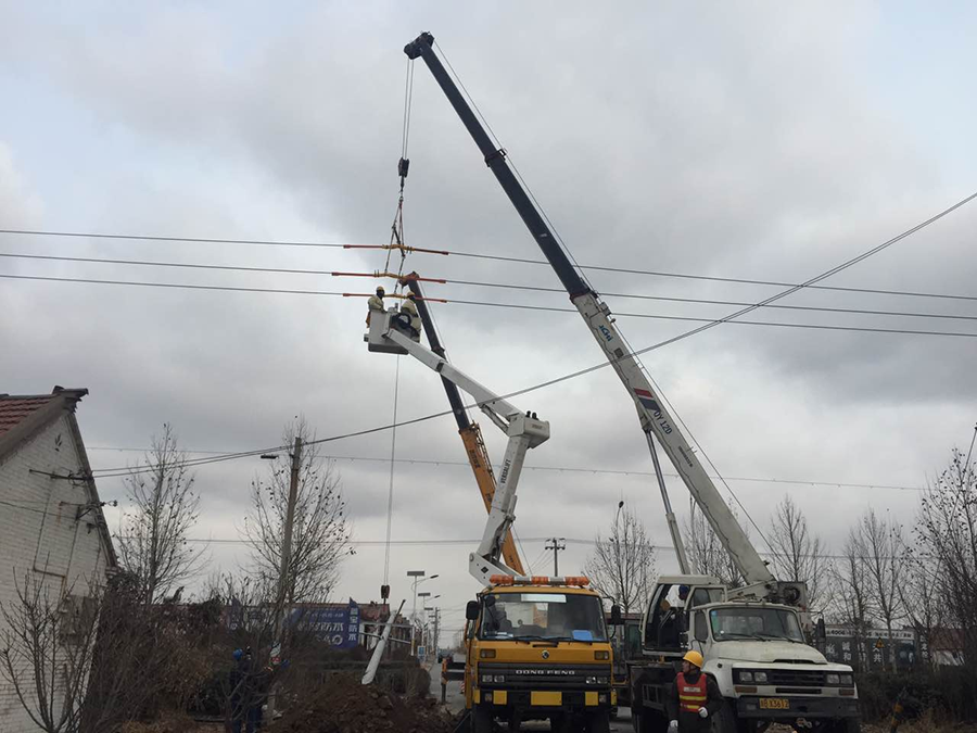 Erect electric pole with power